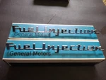 C1 Corvette 1957 Fuel Injection Emblems Nos GM#3742212 Pair Read! 3742213. Fixed Price $60.00.