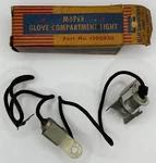 New Old Stock Glove Box Light For 1949-50 Models Mopar #1300820. Fixed Price $145.00.