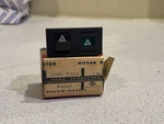 1977-1981 Datsun 810 Hazard Light Switch Nos 25290- W2400. Fixed Price $55.00.