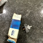 Nos 1973 Lincoln Courtesy Lamp Switch D3VY-13713-A. Fixed Price $65.00.